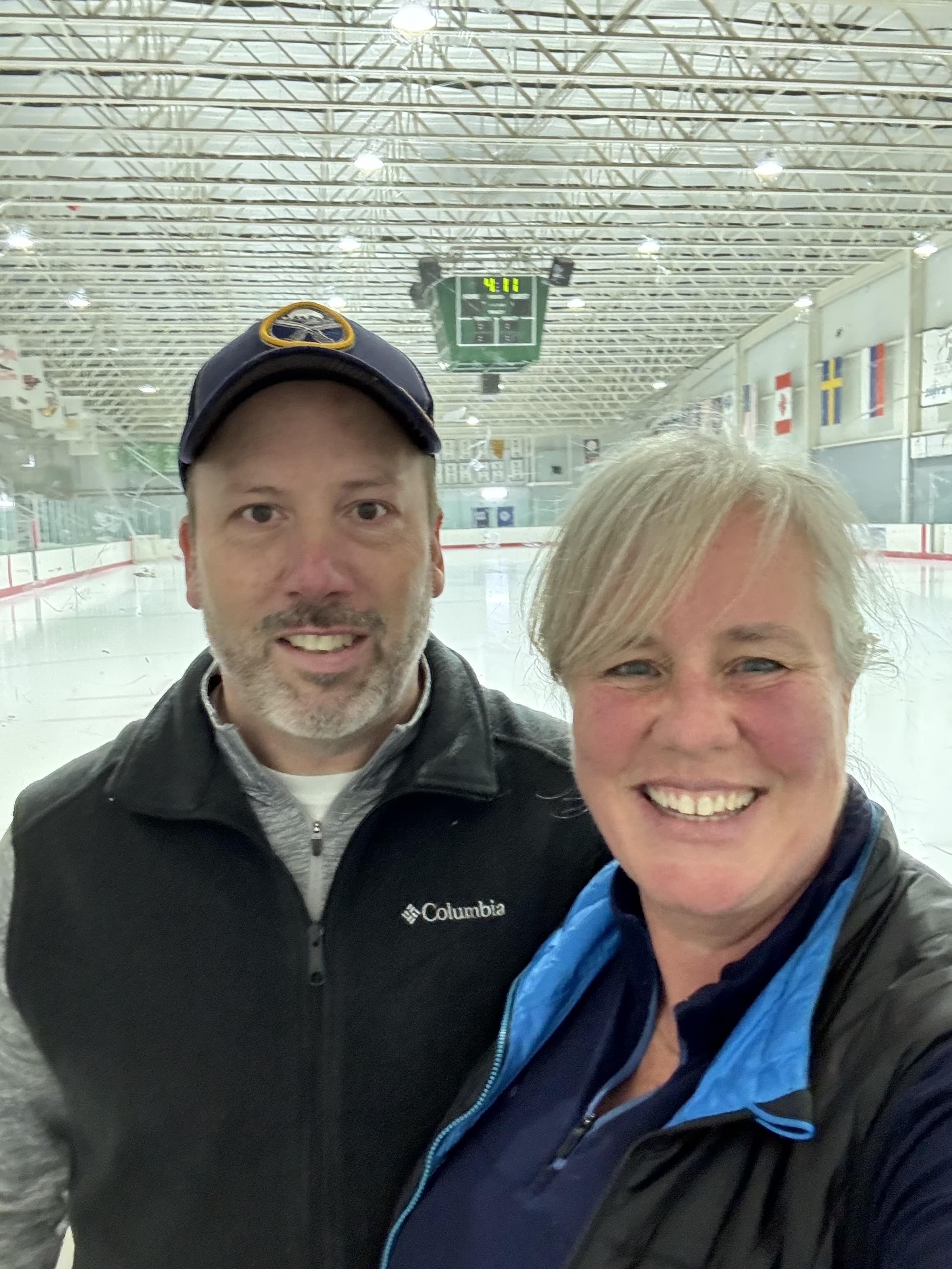 Brian and Whitney Harrington at the Showdown Hockey Tournament in the hockey rink
