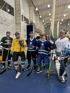 Showdown Tournament's Brian Harrington with his adult hockey league friends